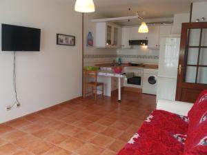 Η κουζίνα ή μικρή κουζίνα στο Apartamento TEO +27 φωτογραφίες