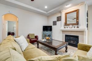 a living room with a couch and a fireplace at Wine Country Hideaway in Windsor
