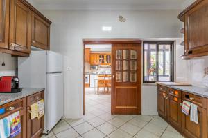 Η κουζίνα ή μικρή κουζίνα στο Encarnação Home