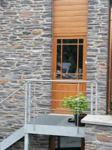 Balkón nebo terasa v ubytování L'Atelier d'Arthur - Gîte chaleureux avec jacuzzi.