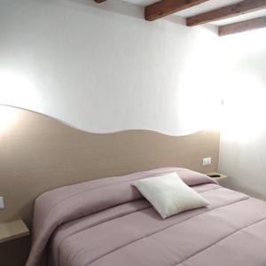 Posteľ alebo postele v izbe v ubytovaní Casa Sole Mare