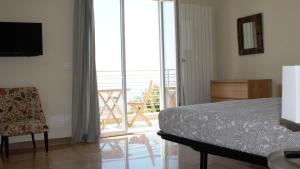 A bed or beds in a room at Le 2 Baie di Sestri Levante