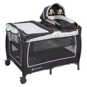 a black baby crib with a backpack on top at Cute Cottage-2 min from downtown Lincoln in Lincoln