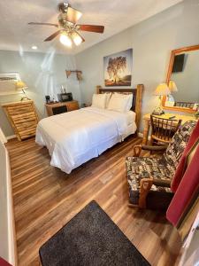 Homestead Inn - Blowing Rock tesisinde bir odada yatak veya yataklar