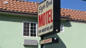 a no gas sign in front of a building at Eagle Rock Motel in Los Angeles