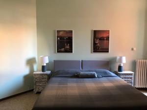 Postel nebo postele na pokoji v ubytování B&B Gloria Apartment