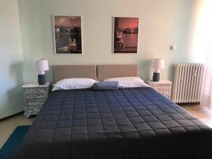Postel nebo postele na pokoji v ubytování B&B Gloria Apartment