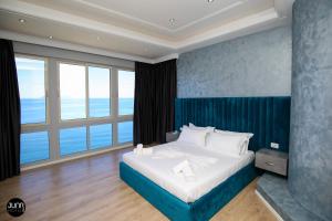 Postel nebo postele na pokoji v ubytování Skyhill Boutique Hotel
