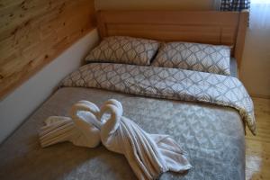 Postel nebo postele na pokoji v ubytování Apartments Avramovic - Bungalow