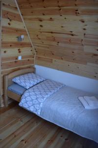 Postel nebo postele na pokoji v ubytování Apartments Avramovic - Bungalow
