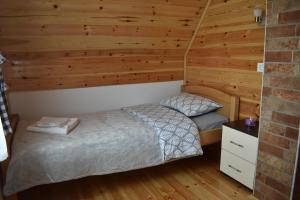 Postel nebo postele na pokoji v ubytování Apartments Avramovic - Bungalow