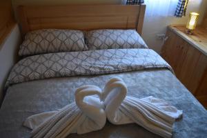 Postel nebo postele na pokoji v ubytování Apartments Avramovic - Bungalow