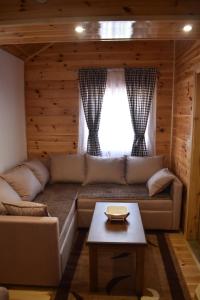 Posezení v ubytování Apartments Avramovic - Bungalow
