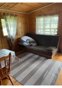 Posezení v ubytování Domek letniskowy nad jeziorem + 38 fotografií