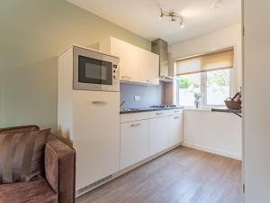 Kuchyň nebo kuchyňský kout v ubytování Tiny house Pimpelmees