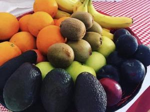 a plate of fruits and vegetables on a table at Glendale Bed and Breakfast, Cushendall in Cushendall