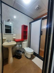Kúpeľňa v ubytovaní Garcias Suites y Hotel
