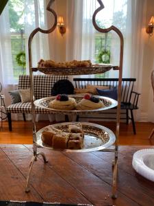 a display of pastries and cakes on a table at The King's Daughters B and B on the Bluff overlooking the Mighty Mississippi in Natchez