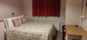 Voodi või voodid majutusasutuse Teac Campbell Guesthouse toas