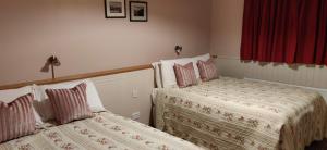 Voodi või voodid majutusasutuse Teac Campbell Guesthouse toas