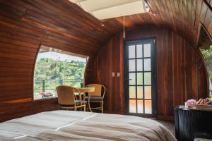 Voodi või voodid majutusasutuse Glamping The Mountain toas
