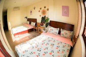 Postel nebo postele na pokoji v ubytování Hệ thống MylaHome - Chi nhánh Ks Kim Châu