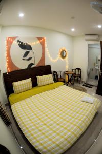 Postel nebo postele na pokoji v ubytování Hệ thống MylaHome - Chi nhánh Ks Kim Châu