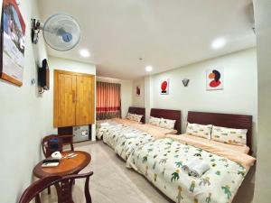Postel nebo postele na pokoji v ubytování Hệ thống MylaHome - Chi nhánh Ks Kim Châu