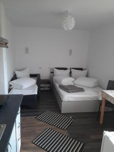 Giường trong phòng chung tại Apartamente Ambrus E Studio 21 Praid