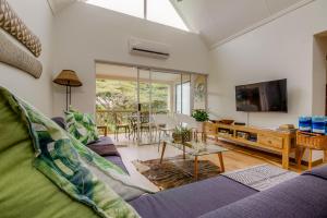 TV a/nebo společenská místnost v ubytování The Bridge 54