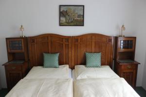 Postel nebo postele na pokoji v ubytování Farma Rampuše - Chata Kovárna
