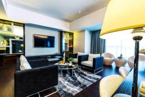TV a/nebo společenská místnost v ubytování Ixora Hotel Penang