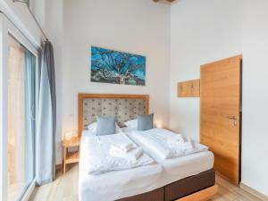 Posteľ alebo postele v izbe v ubytovaní Chalet in Niedernsill near Ski Slopes