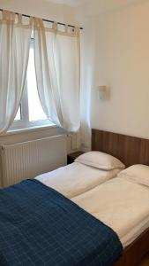 Postel nebo postele na pokoji v ubytování Casa Ormenisan