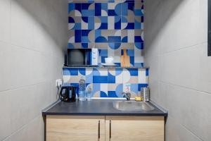 Kuchyň nebo kuchyňský kout v ubytování Sliema Creek Suites