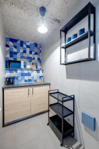 Kuchyň nebo kuchyňský kout v ubytování Sliema Creek Suites
