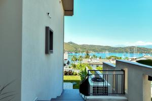 a stairway leading to a balcony with a view of the water at Bliss Suites & Hotel in Fethiye