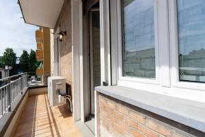 A balcony or terrace at GetTheKey Pasubio Apartment