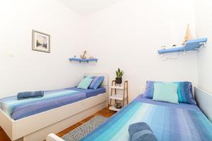 Кровать или кровати в номере Holiday House Dijana, Kanica