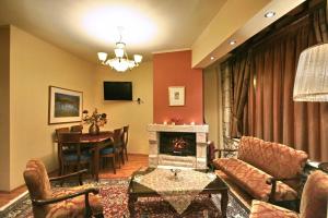 TV a/nebo společenská místnost v ubytování Guesthouse Stemnitsa