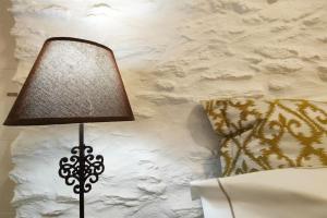 Postel nebo postele na pokoji v ubytování Amarienitas Suites
