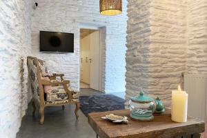 TV a/nebo společenská místnost v ubytování Amarienitas Suites