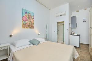 Postel nebo postele na pokoji v ubytování Room Eddie
