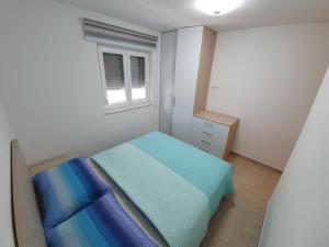 Postel nebo postele na pokoji v ubytování Apartman Lea Makarska
