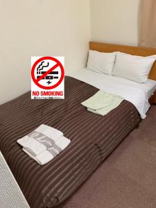 Postel nebo postele na pokoji v ubytování Matsue Urban Hotel Lake Inn