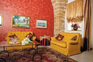 Posezení v ubytování B&B Principe Augusta + 10 fotografií