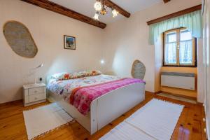Postel nebo postele na pokoji v ubytování House Dorino