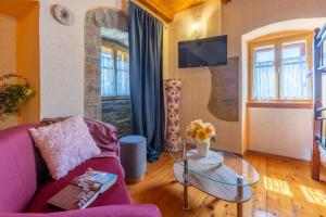 TV a/nebo společenská místnost v ubytování House Dorino