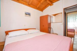 Ένα ή περισσότερα κρεβάτια σε δωμάτιο στο House OLIVA