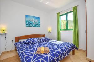Postel nebo postele na pokoji v ubytování House Oliver